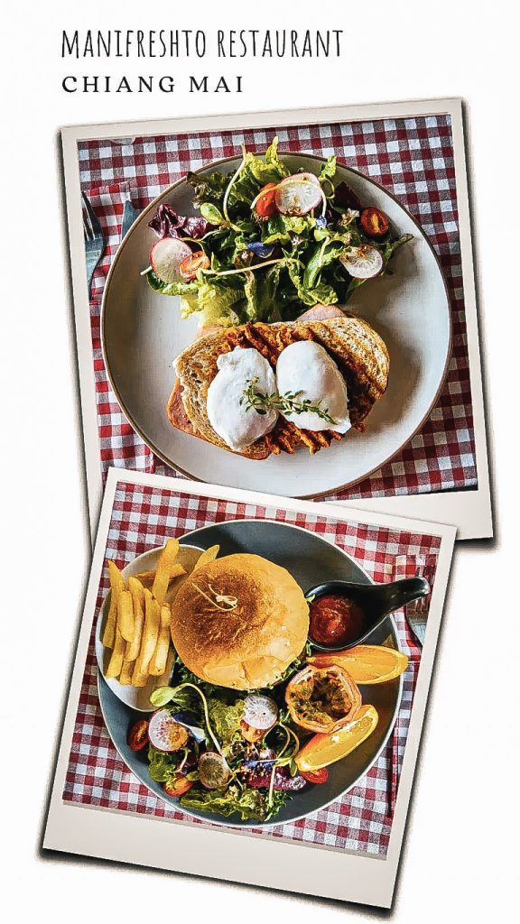 assiette de salade et de burger du manifreshto restaurant de chiang mai presenté sur une nappe a carreaux rouge et blanche