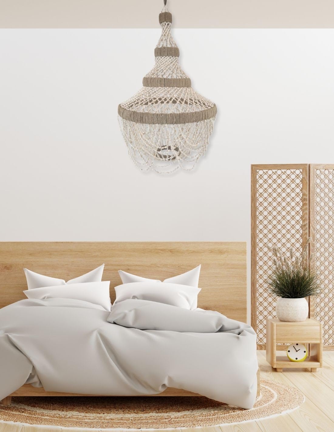 lustre en coquillage style balinais au dessus d'un lit
