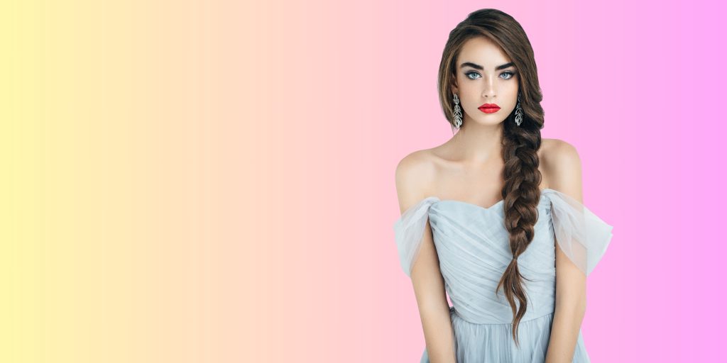 jeune femme avec une longue tresse de coté en tenue de soirée